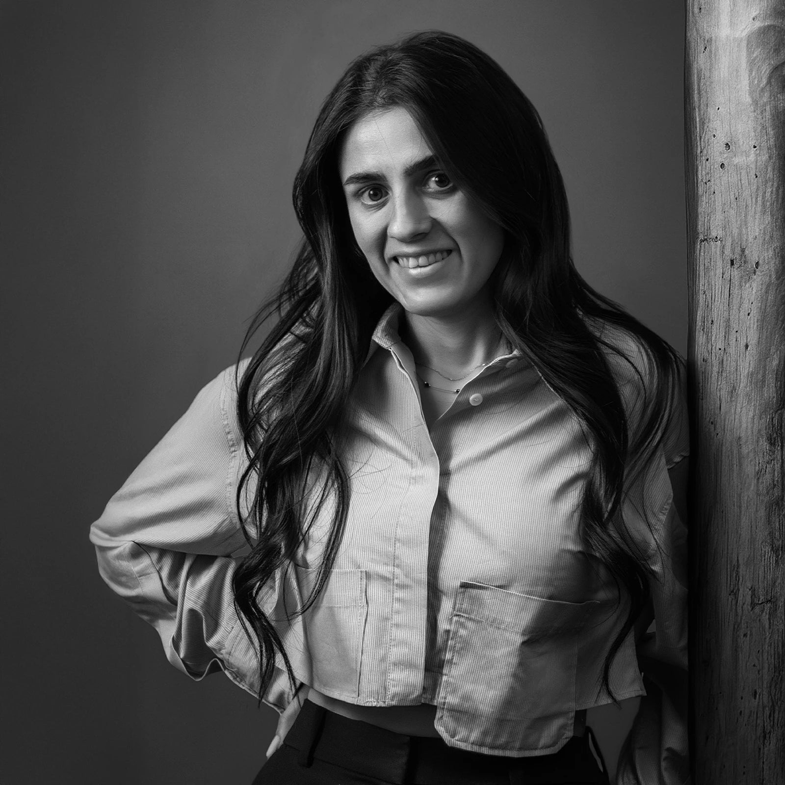 Georgiana Ciolac, the founder of Ahaa® Skincare, in a black and white editorial portrait.