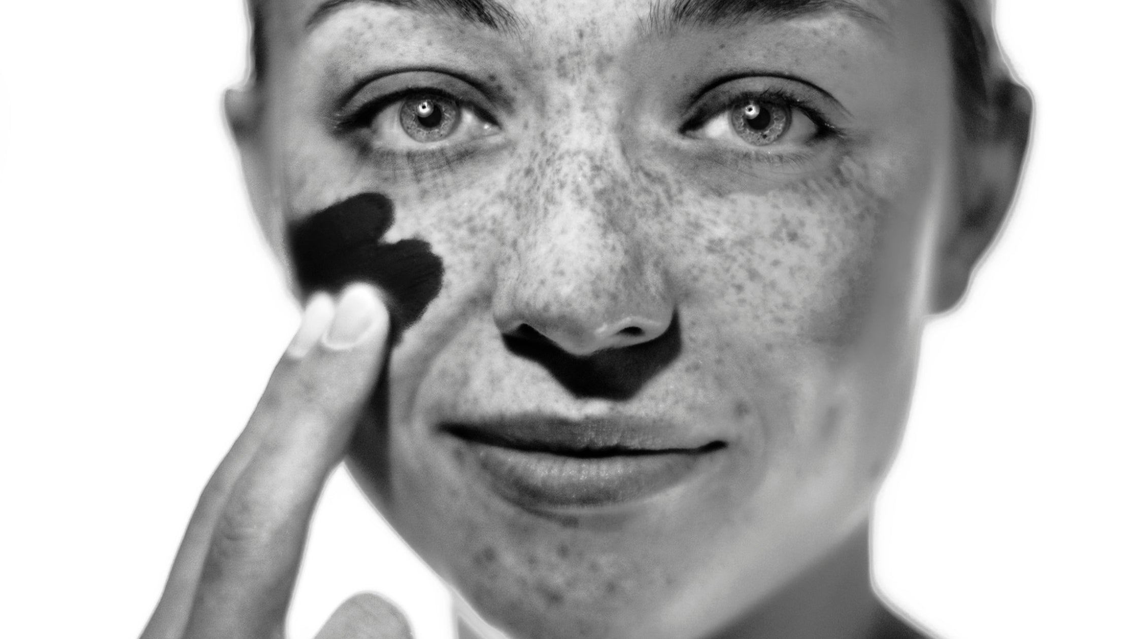 THE SHIELD+ SPF 30 sunscreen applied as the final step of a skincare routine