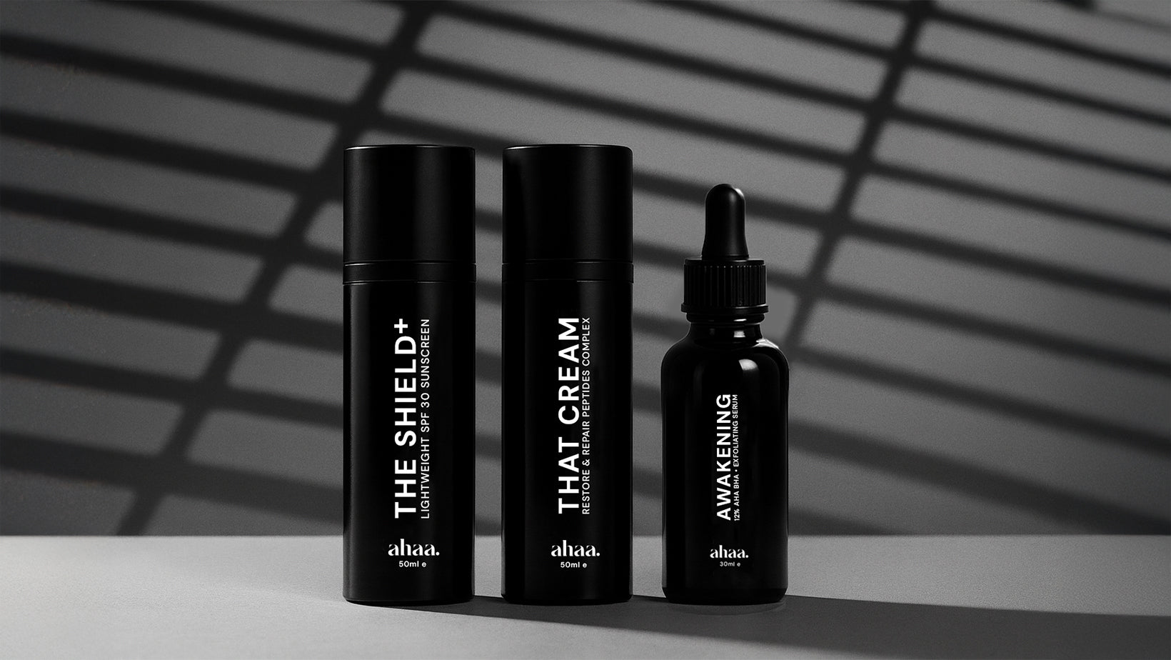 the daily routine by ahaa skincare featuring Awakening AHA + BHA serum, That Cream with Peptides and The Shield sunscreen